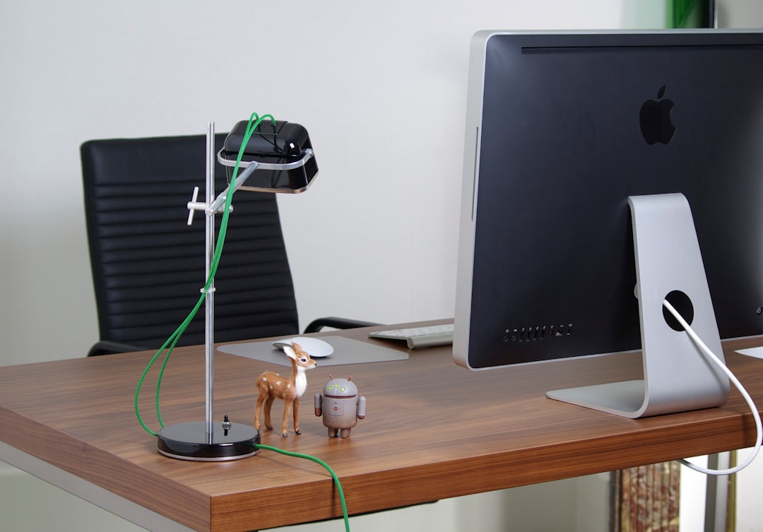 A Modern High End Office Workspace Featuring A Sleek Laptop Displaying Ai Content Generation Tools